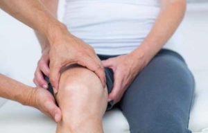 Тяжесть и боли в колене