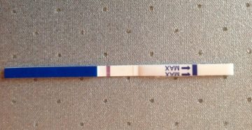 Тест на беременность показывает очень слабо вторую полоску